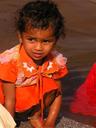 Another girl doing her OWN washing at the river.